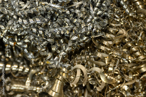 Close-up scene of the metal materials scrap from turning process.
