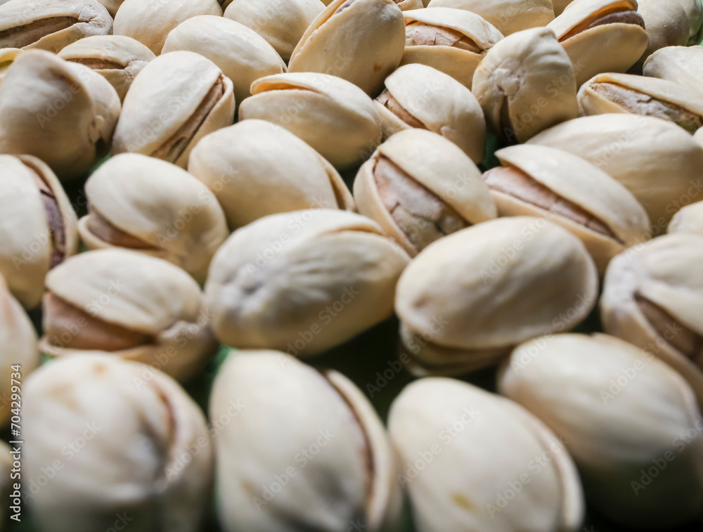Heap of pistachio nuts close up