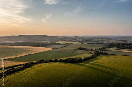 Summer aerial drone landscape image of English countryside surrounding Firle Beacon in South Downs National Park © veneratio