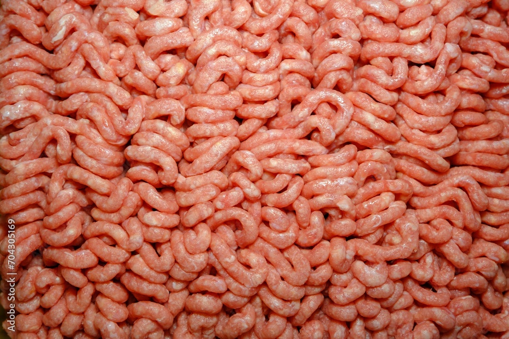 Fresh ground beef on a dark background. Close-up of minced meat Fresh ground beef on a dark background. Close-up of minced meat