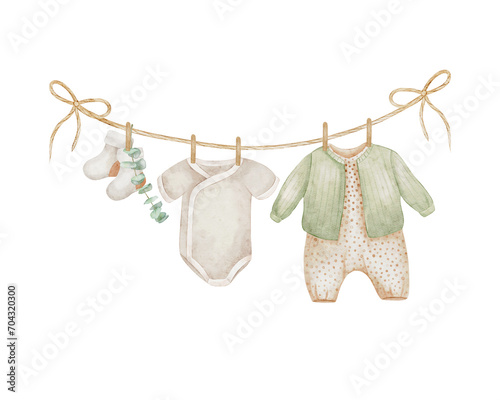 Baby clothes hanging on a rope isolated on white background. Watercolor hand drawn illustration. Kids clothing, socks, eucalyptus branch.  Perfect for cards, invitations and packaging.