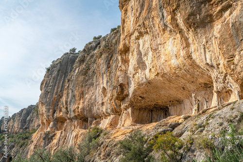 Adamkayalar (literally "man-rocks") is a location in Mersin, Turkey famous for rock-carved figures, facing the gorge, there are carved figures of eleven males, four females and two children one ibex