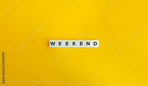Weekend Word on Block Letter Tiles on Yellow Background. Minimalist Aesthetics.