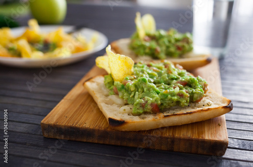 Morning toast with melted cheese and guacamol