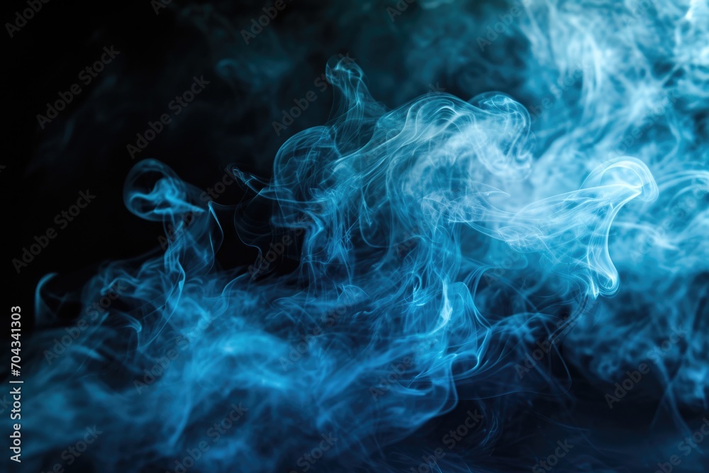 Smoke captured in a close-up shot on a black background. Versatile image suitable for various projects