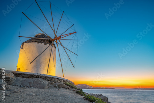 Traditional windmill at sunset in Mykonos, Greece