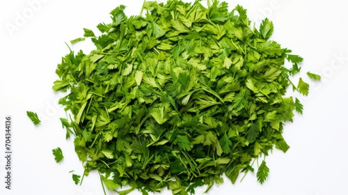 Top view of pile of chopped dry parsley leaves isolated on white - culinary herb  cooking ingredient  food photography  