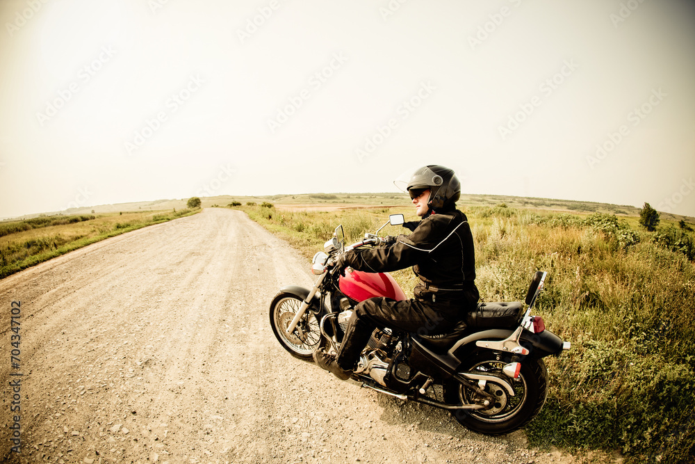 Biker on the country road