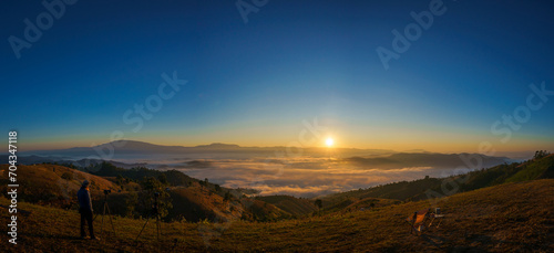 Beautiful panorama scenery of the sea of mist in the morning at Camp Car Camping site with a viewpoint nature of Doi Balu Kho Mountain  Mae Chaem  Chiang Mai  Thailand. Background concept.