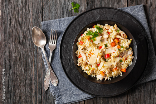 Chicken Fried Rice with vegetables in black bowl