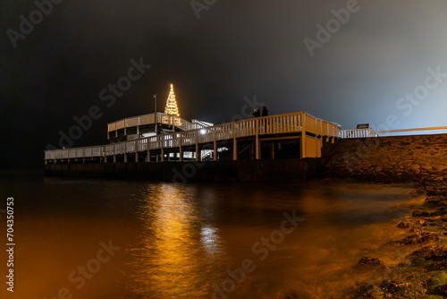 Alte Liebe (Old Love), famous observation deck in Cuxhaven, Germany at the river Elbe at Christmas time at night