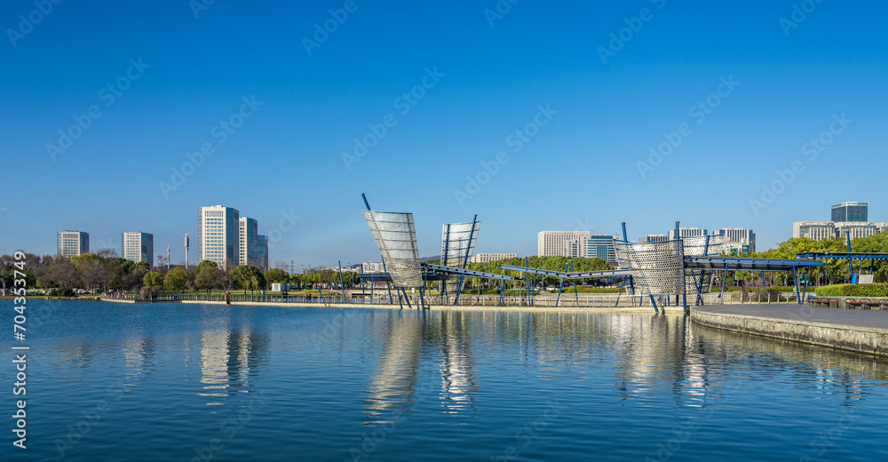 Fototapeta premium Scenic bridge in a park in Wuxi, China on a sunny day