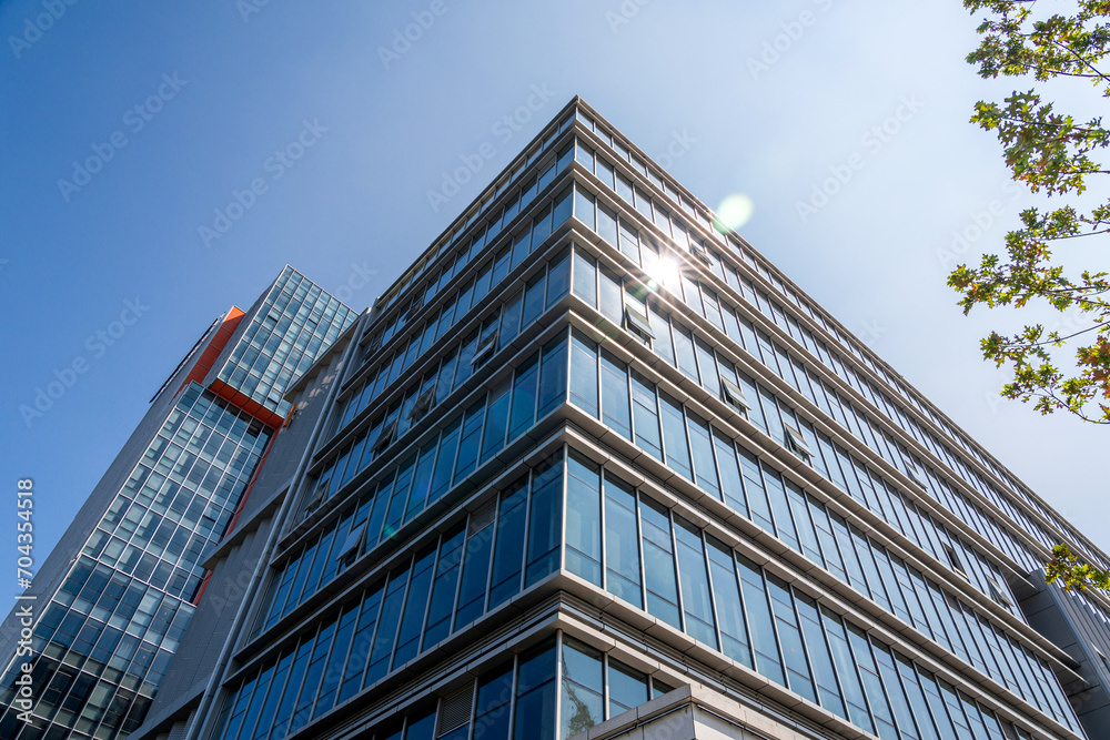 Close-up of a modern business city building looking up Close-up of a modern business city building looking up