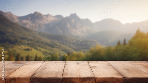 Space for advertising on wooden table in the forest and mountains background 