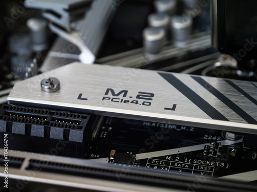 An M.2 M2 PCIe SSD solid state drive storage slot on a motherboard, closeup view