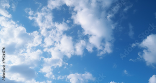 Light blue sky with clouds