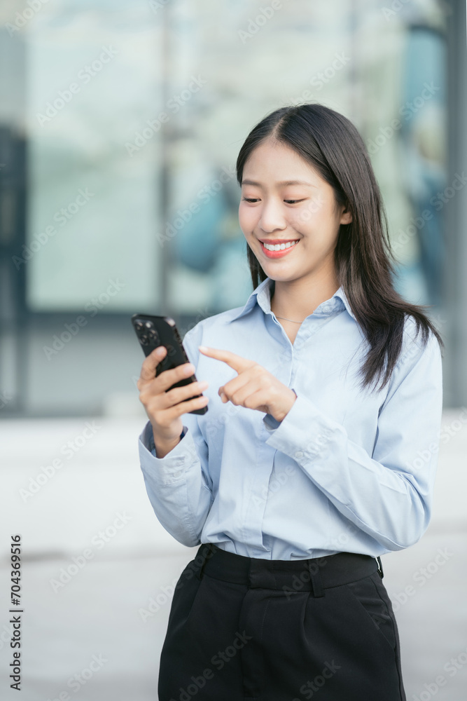 Happy young woman smiling while reading smartphone, smiling businessman reading text with smartphone with drinking coffee.