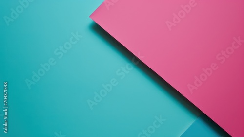 Minimalist design with cyan and magenta paper colors, creating an abstract and modern background with subtle shades of pink and blue. 