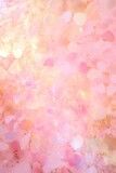 Abstract pink background with a close up view of a shiny and brilliant gold dust. Texture for project, beauty background.	