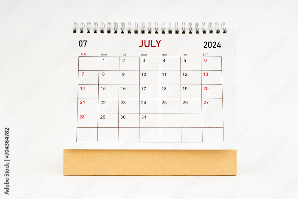 July 2024 desktop calendar isolated on white background. July 2024 desktop calendar isolated on white background.