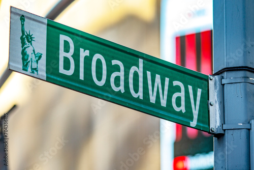 A sign indicating the famous Broadway street which is part of a district of Manhattan, in the Big Apple of New York (USA). photo