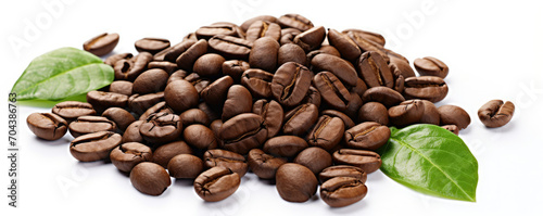 A Pile of Coffee Beans With Green Leaves