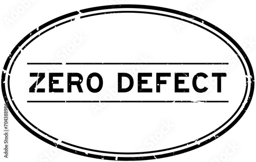 Grunge black  zero defect word oval rubber seal stamp on white background