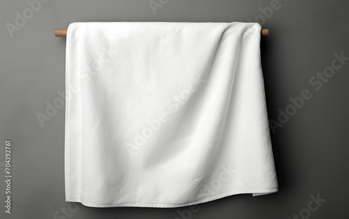 White Towel Hanging on Wall, Clean, Simple, and Practical Bathroom Accessory