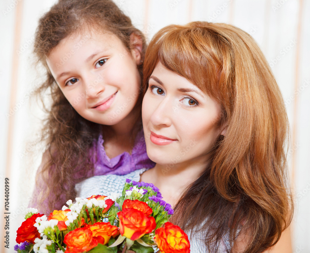 Portrait of happy mother and her little daughter Portrait of happy mother and her little daughter