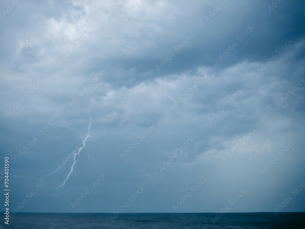 threatening cloudy sky with flashes and lightning at the sea-