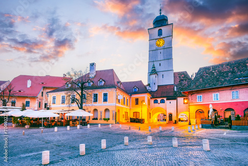 Sibiu, Romania. Morning dusk with Council Tower in Lesser Square. Medieval city in Transylvania.