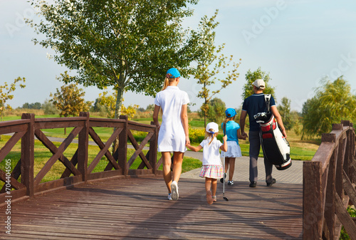 Happy family in golf country club