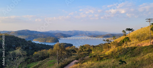 "Serene lake in the mountains of Brazil: lush and tranquil setting, natural beauty that enchants. Highlight your creativity with this stunning view." © sarsa