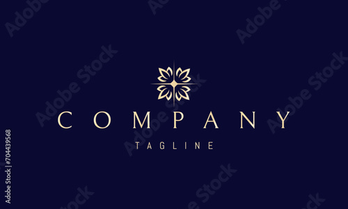 Vector golden logo with an abstract image of a star pattern with leaves.