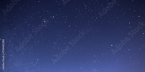 Starry night dark blue sky background