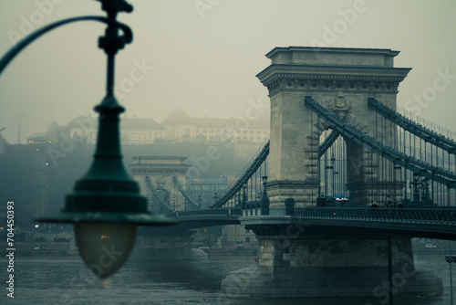 Fotografie Chain bridge in the fog.