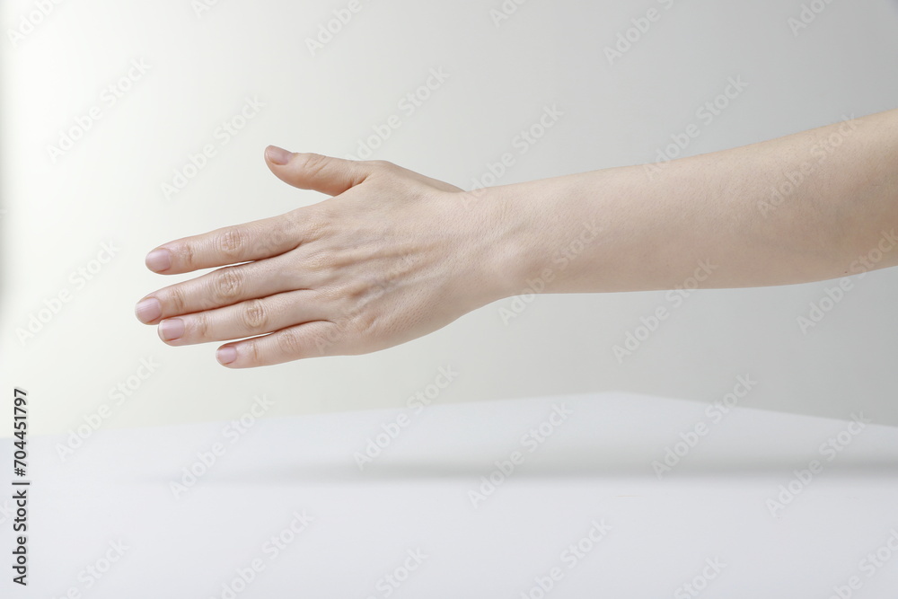 Close up of woman hand offering handshake