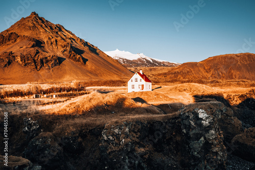 Lonely house on the Coastline at Arnastapi, a fishing village on the Snaefellsnes peninsula in West iceland. photo