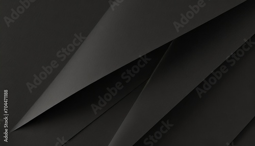 close up of a sheet of black paper with folds