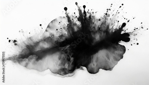 black ink watercolor flow blot with drops splash abstract texture color stain on white background photo