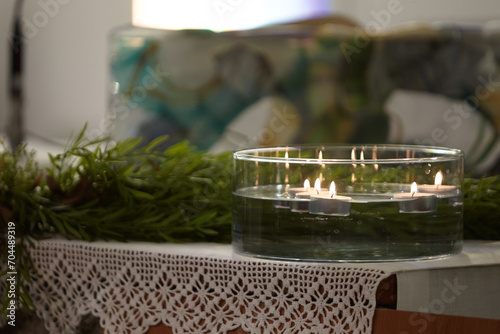 vessel with candles floating in church