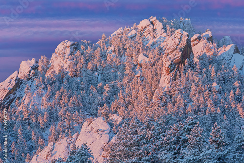 Winter landscape at sunrise of the snow flocked Flatirons, Front Range, Rocky Mountains, Boulder, Colorado, USA