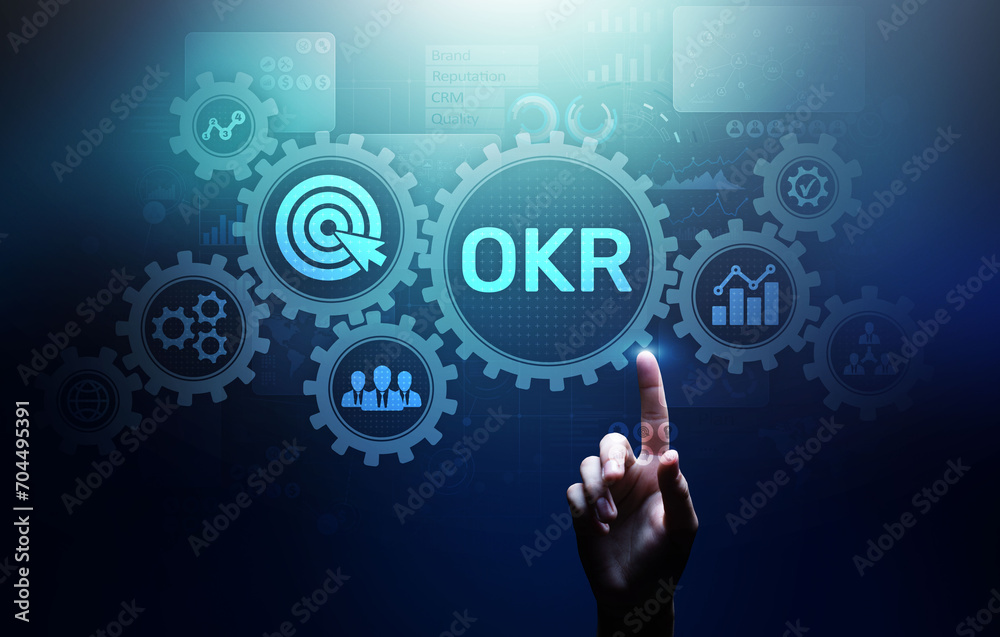 Objective Key Results Business technology process improvement concept on virtual screen. Objective Key Results Business technology process improvement concept on virtual screen.