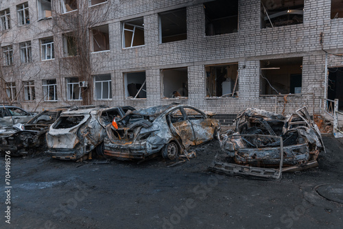 Shahed blew up houses. A bombed residential building and burnt cars after the strike. War in Ukraine, the city of Dnipro. Burnt out car.