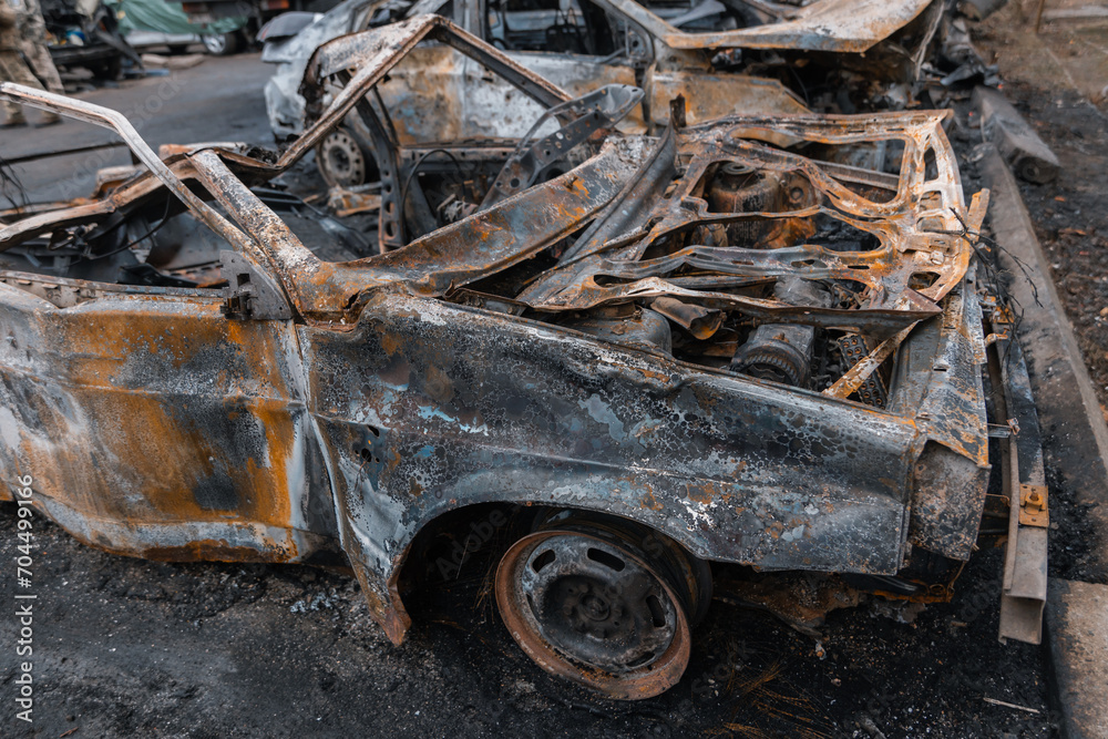 Shahed blew up houses. A bombed residential building and burnt cars after the strike. War in Ukraine, the city of Dnipro. Burnt out car. Shahed blew up houses. A bombed residential building and burnt cars after the strike. War in Ukraine, the city of Dnipro. Burnt out car.