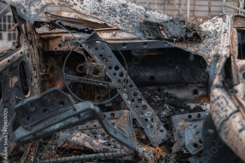 Shahed blew up houses. A bombed residential building and burnt cars after the strike. War in Ukraine, the city of Dnipro. Burnt out car.