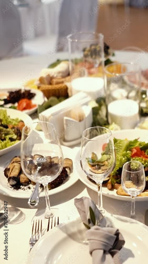 decoration of the wedding presidium for the banquet, table of the bride and groom, many delicious dishes on the festive table, close-up decoration of the wedding presidium for the banquet, table of the bride and groom, many delicious dishes on the festive table, close-up