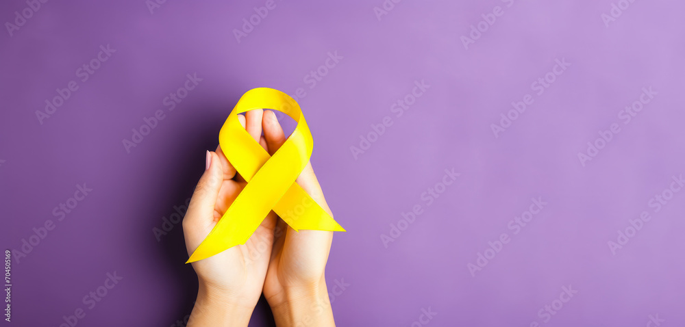 yellow Ribbon against white background for endometriosis awareness campaign, suicide prevention , Childhood cancer. - obrazy, fototapety, plakaty 