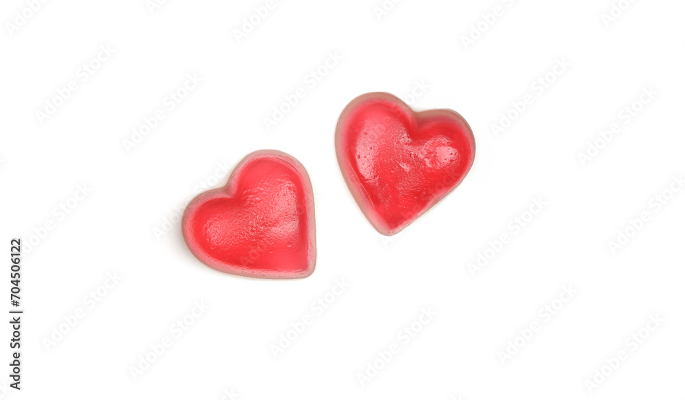 Two heart shaped jelly gummy treats isolated on white background