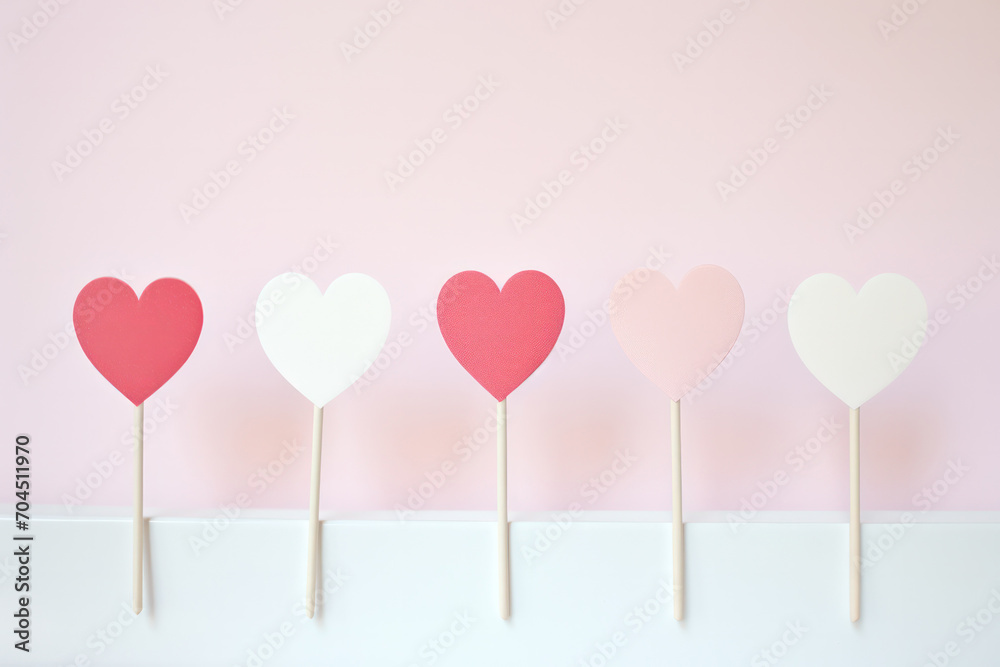 Wooden Love, Heart Shapes on Sticks - A unique Valentine's concept with hearts on wooden sticks.